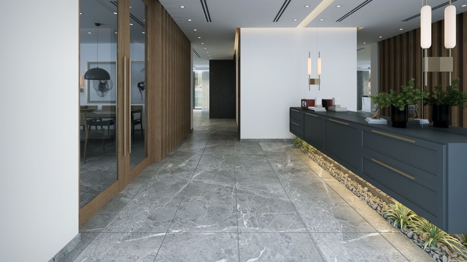 Modern interior hallway with marble floors, wood panels, and green plants